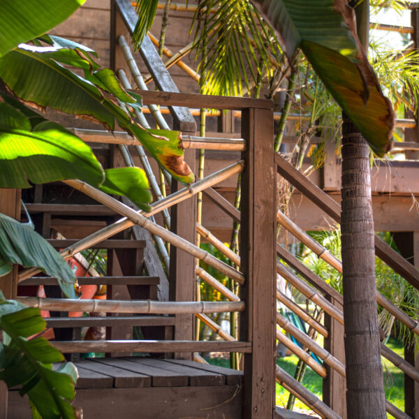 Treehouse staircase, detail with bamboo accents at Tropic Shots production set